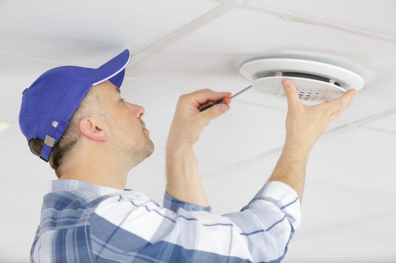 Local Beeping Smoke Detector Repair pros at work